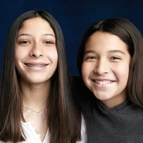 Mom and daughter smiling after orthodontic treatment together | Soni & Snipes Orthodontics Northeast GA